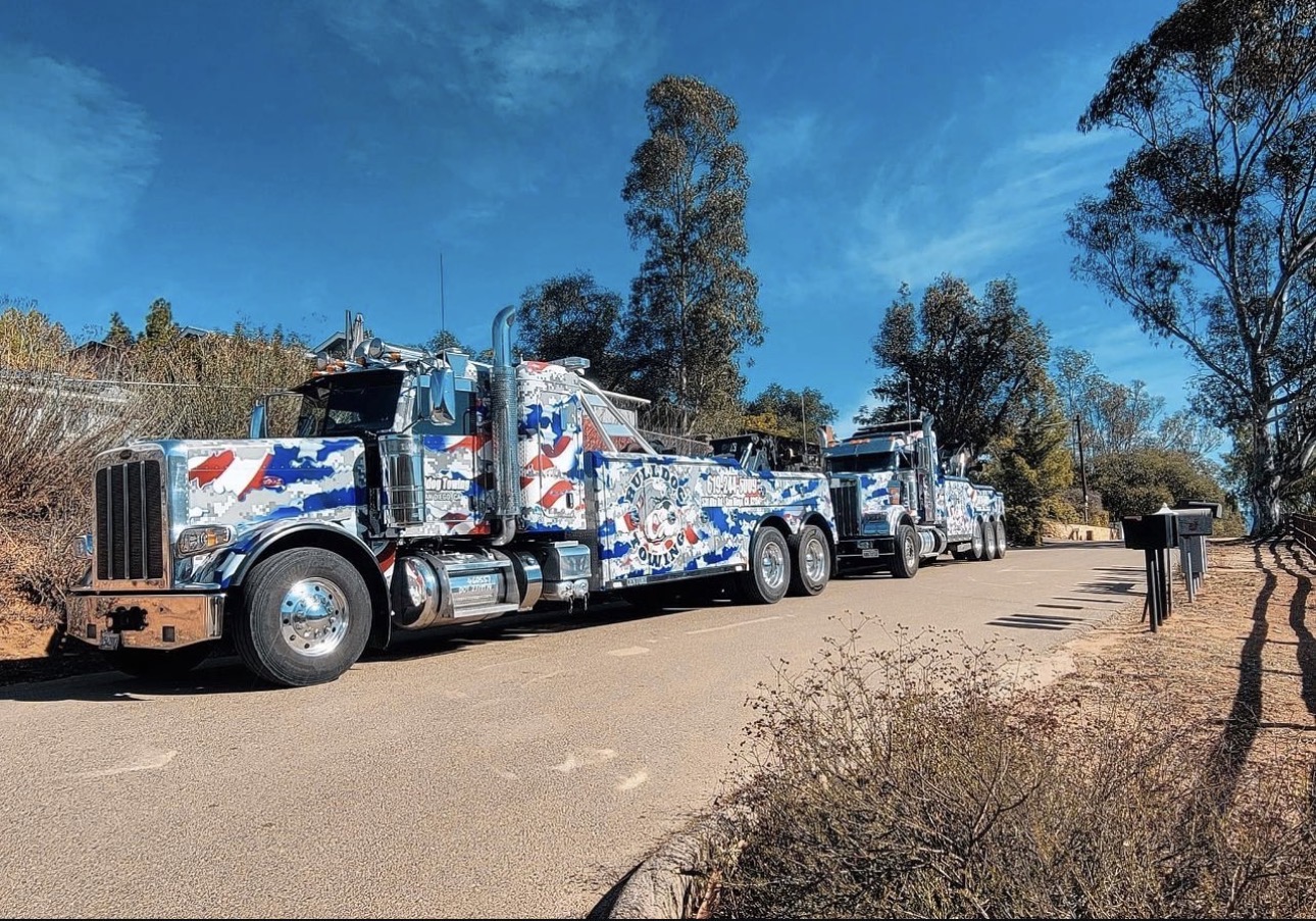 Bulldog Towing deploying multiple heavy-duty tow trucks for a large-scale recovery operation.