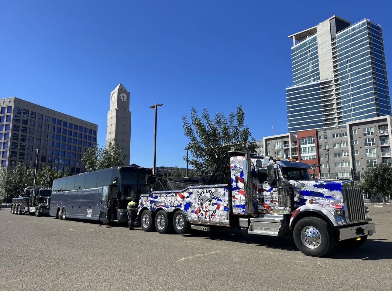 Bulldog Towing performing a heavy-duty recovery operation within an urban San Diego location.